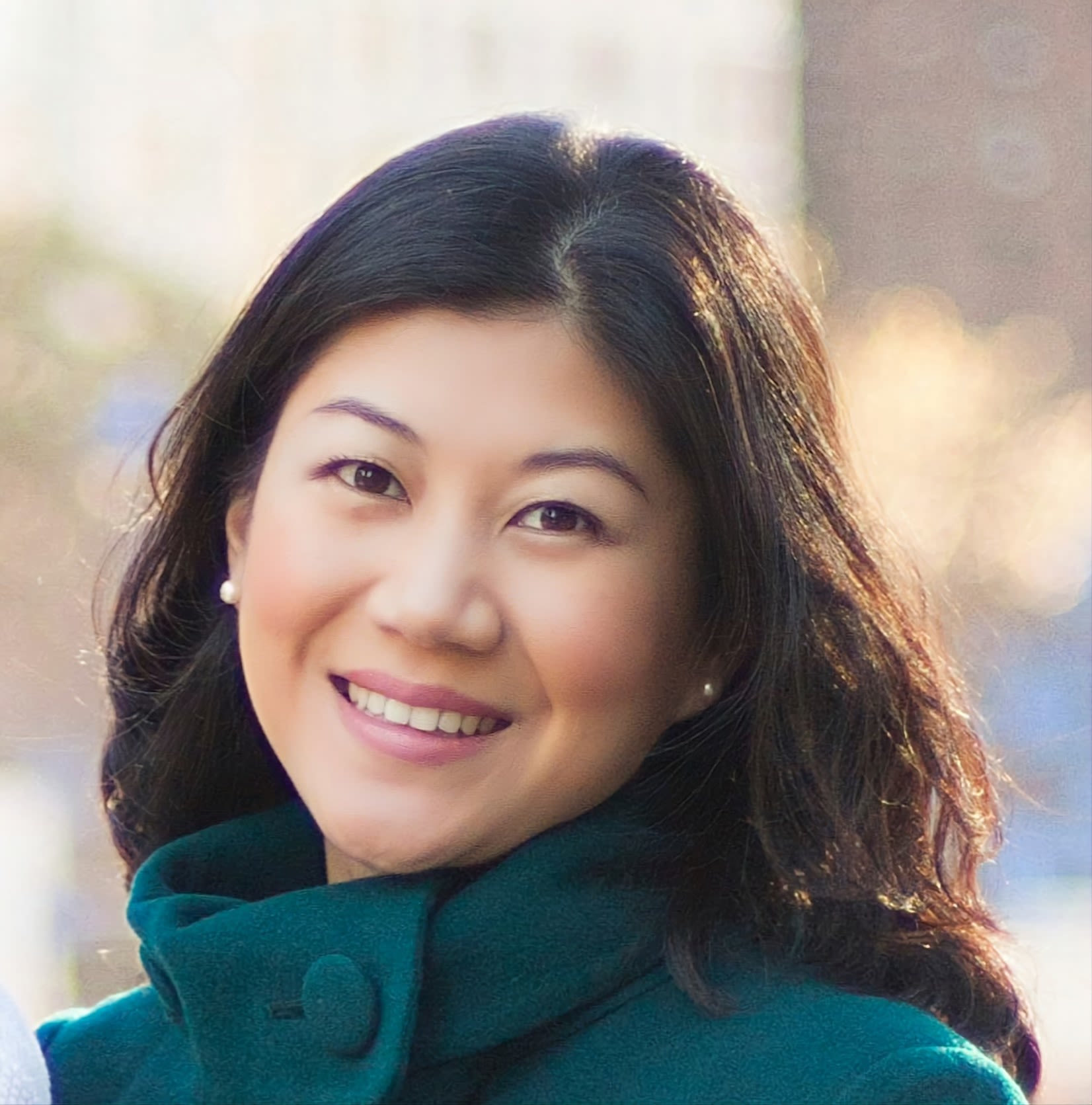 Alumna smiling