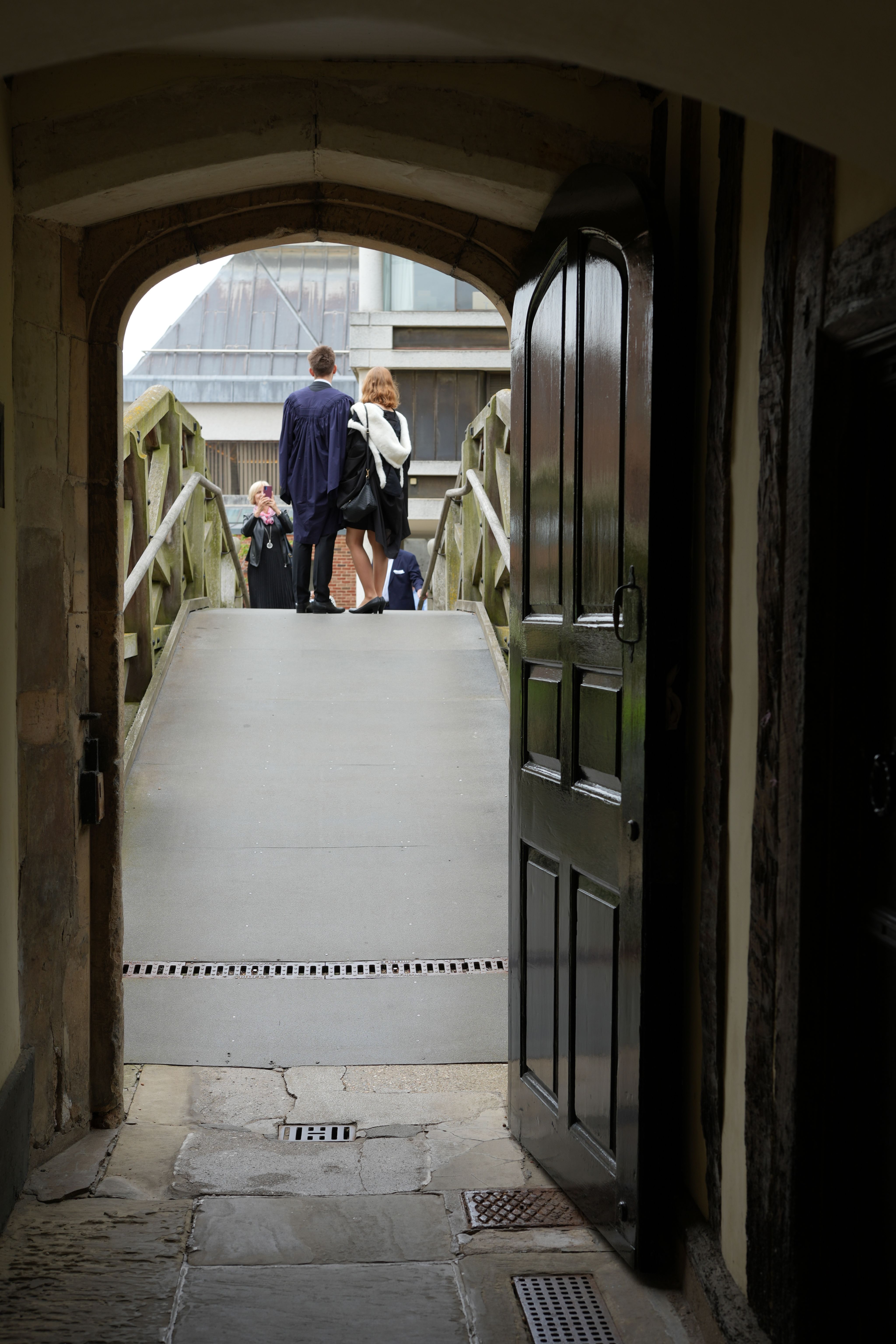two people posing on the bridge
