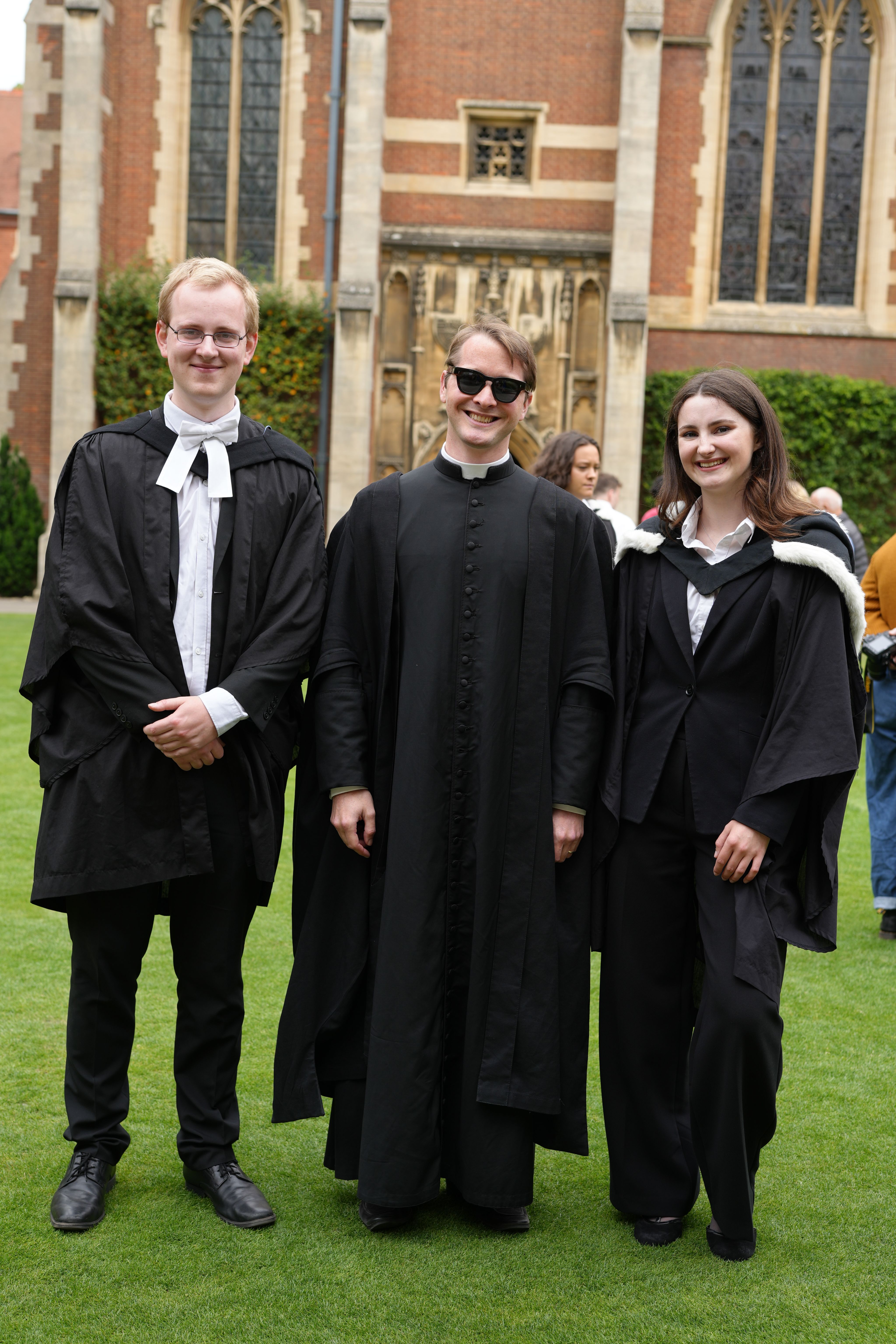 Chaplain with students outside
