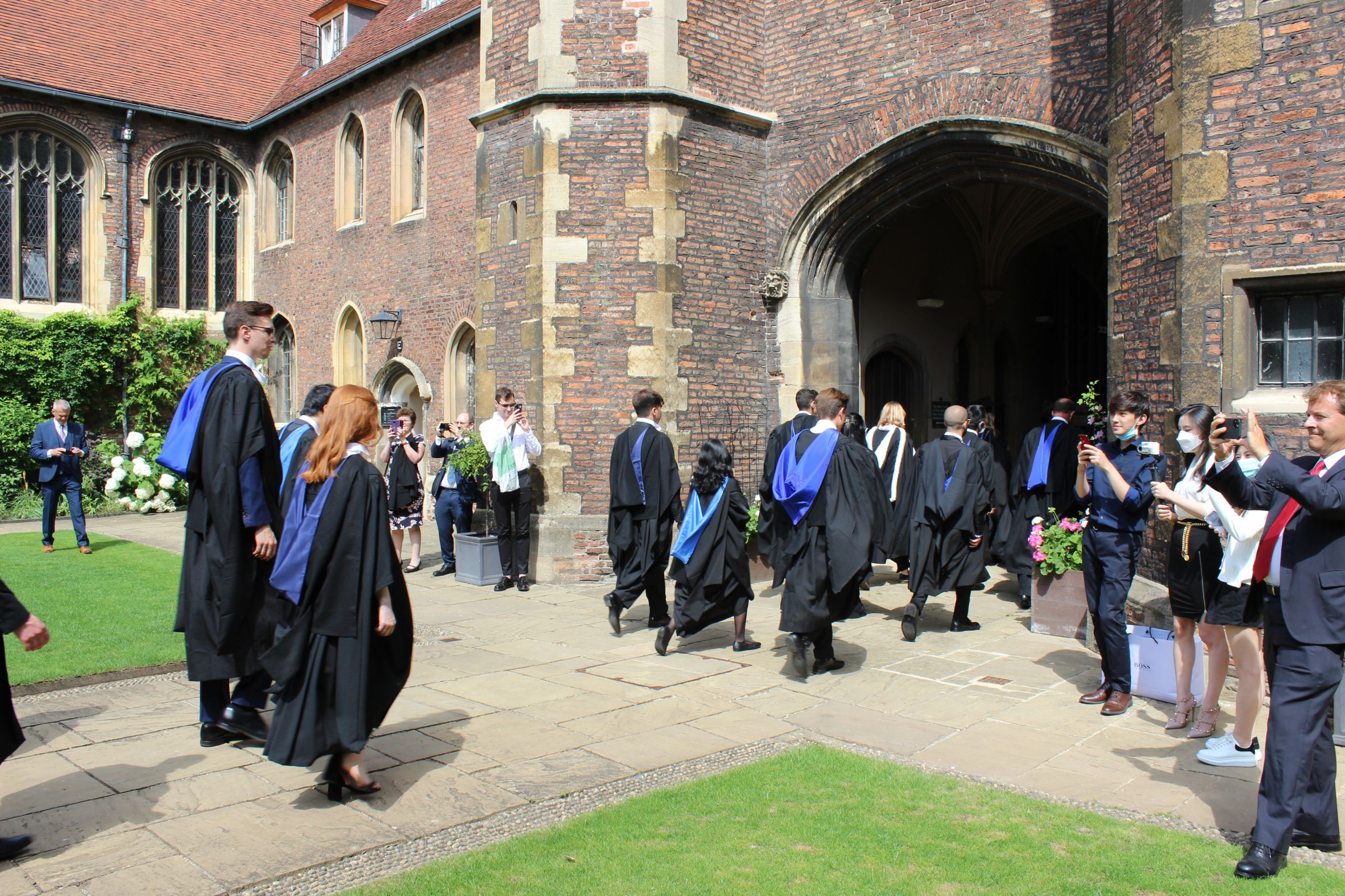 Graduands leaving Queens' for Senate House