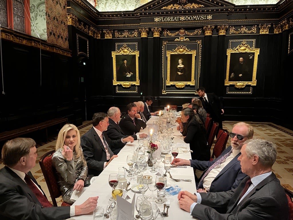 Attendees sat at a table at the Stuart Bridge Dinner in Old Hall