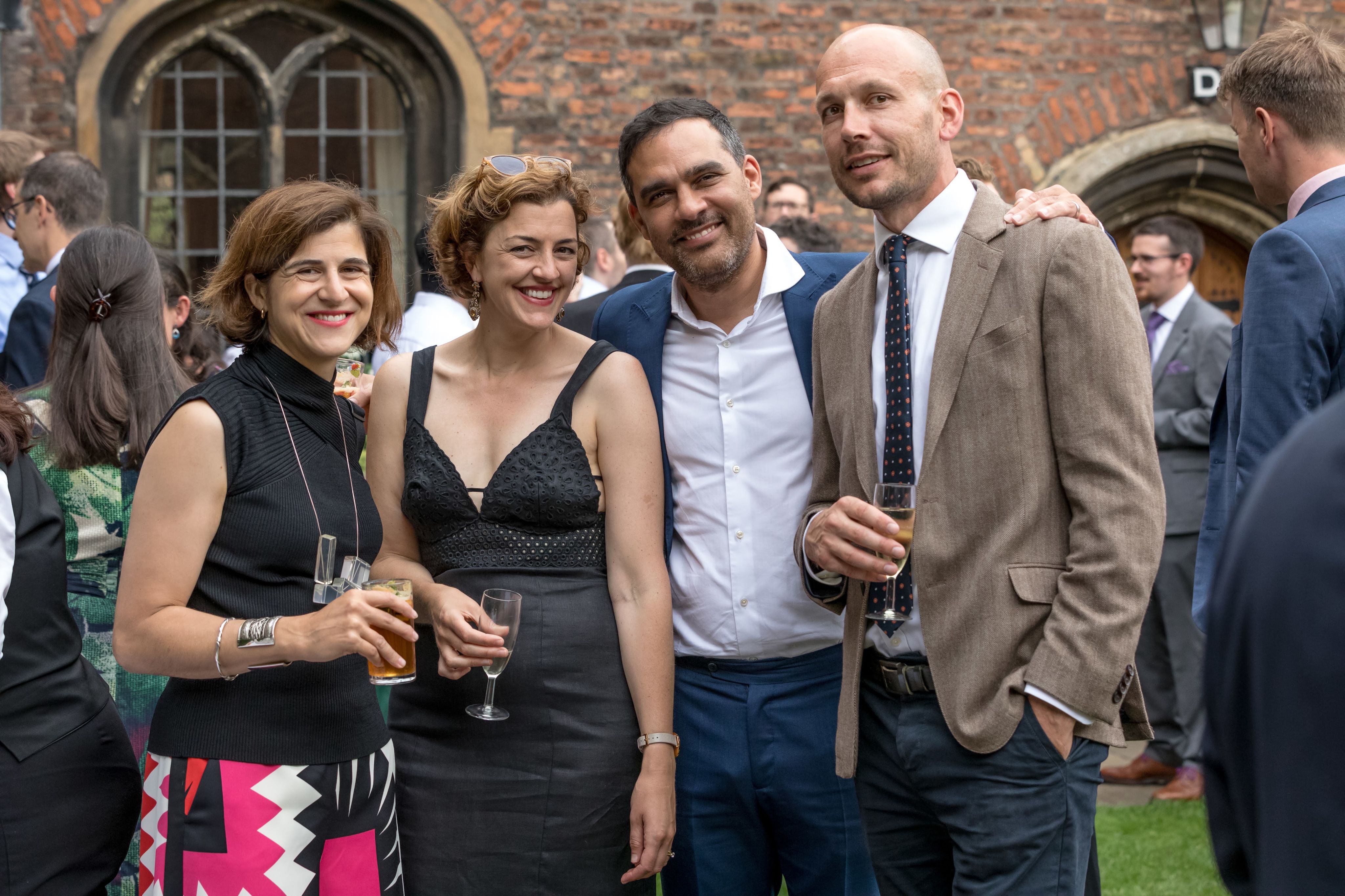 A group of four friends gathered at Queens'